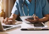 Doctor working on a computer